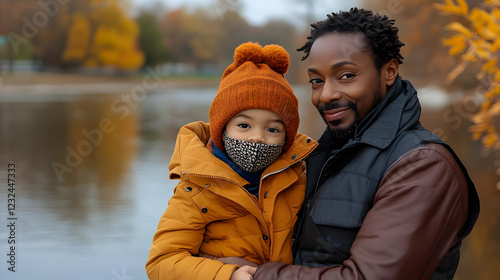 Father and Child Embrace Ne...