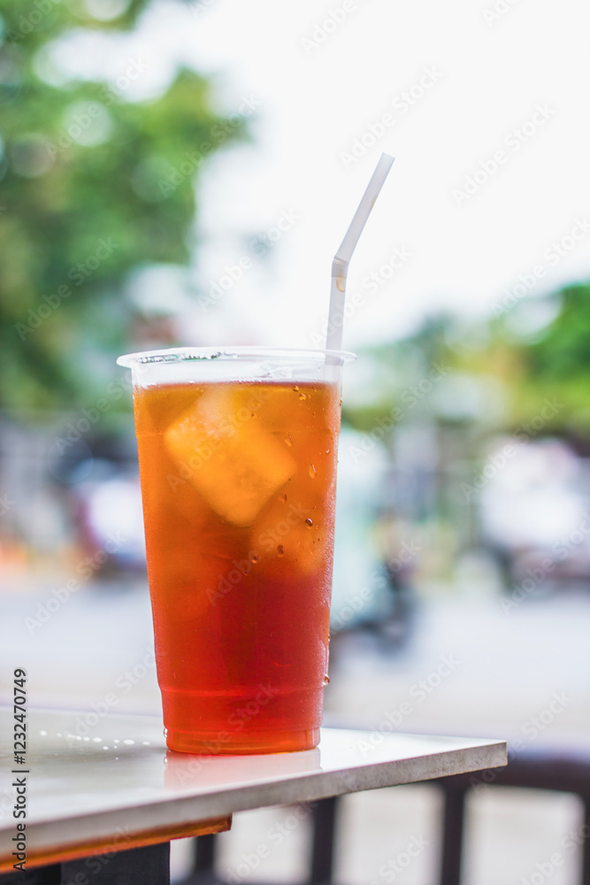 Fresh iced tea on the table with blurred background Fresh iced tea on the table with blurred background