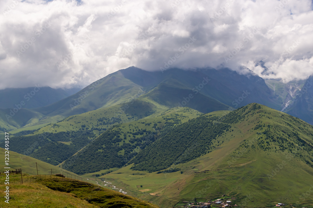 Summer landscape in the mountains. Mountain peaks of North Ossetia. Mountain gorges. View of the mountain peaks. Nature in the mountains. Highlands. Summer landscape in the mountains. Mountain peaks of North Ossetia. Mountain gorges. View of the mountain peaks. Nature in the mountains. Highlands.