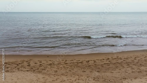 drone footage of a sandy beach shoreline in County Wexford, Ireland