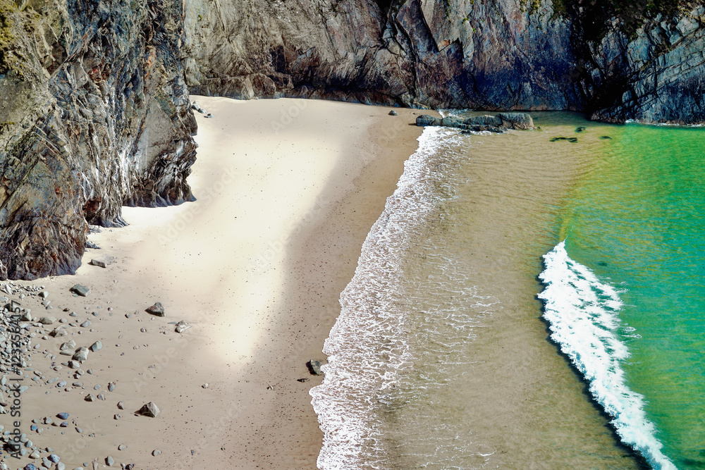 Traeth Llyfn beach and cliffs on Pembrokeshire Coast Path near Porthgain, Pembrokeshire, Wales