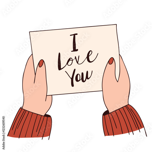 Hands holding a heartfelt I Love You card. For Valentine's Day, romantic greetings, love letters, and romantic messages.