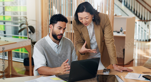 Collaboration, laptop and problem solving with business people at desk in office for systems training. Assistance, help and question with supervisor talking to employee in workplace for management