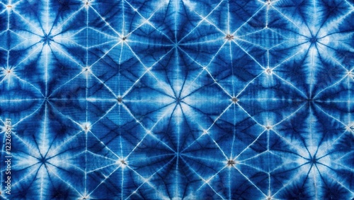 Intricate Shibori print featuring resist-dyed threads in a bold geometric pattern, showcasing the beauty of traditional Japanese tie-up technique , binding, art