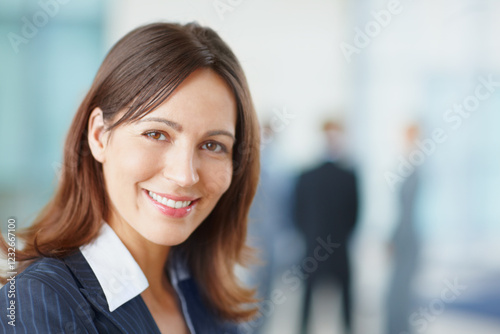 Woman, business lawyer and confident in office, professional and proud of legal constitution. Female person, portrait and expert advocate at law agency, justice advisor and worker for company policy