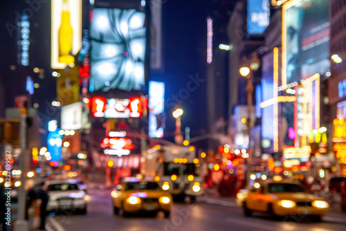 Conceptual Image of the iconic Times Square in New York city, USA at night showcasing the lights, stores, night life and glamour of the city that never sleeps.