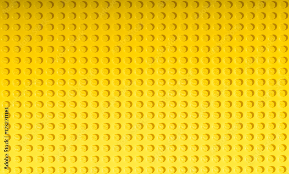 Obraz premium Yellow background of the LEGO Classic plate