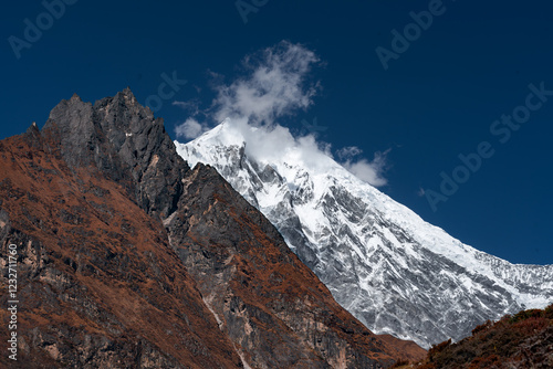 Langtang Lirung mountain peak seen from Kyanjin Ri in the himalayas of Kyanjin Gompa, Nepal photo