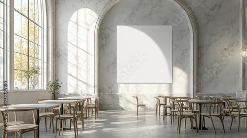 Empty cafe interior with large blank canvas, bright sun.  Possible use Mockup photo