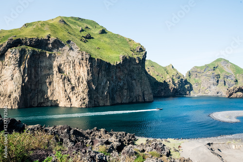 Wake created by the water scooter in the water at the Westman Islands photo