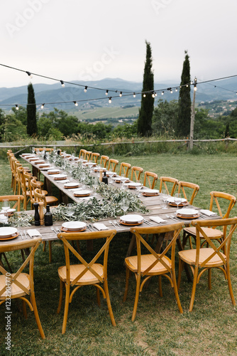 Rustic Wedding Table Decor with Greenery and Elegant Tableware in Tuscany
