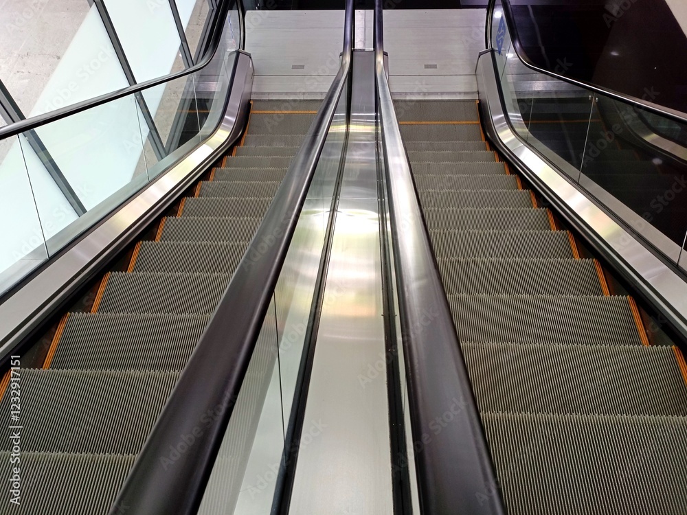 Moving escalator in the office hall perspective view Moving escalator in the office hall perspective view
