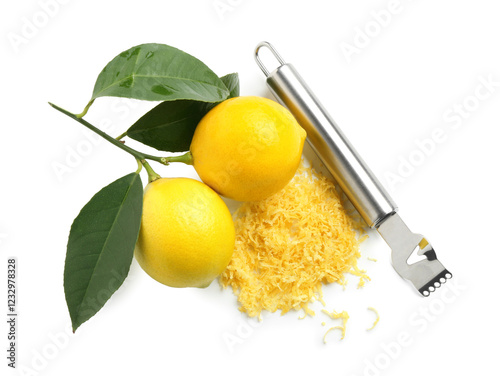 Lemon zest, fresh fruits and zester tool isolated on white, top view photo