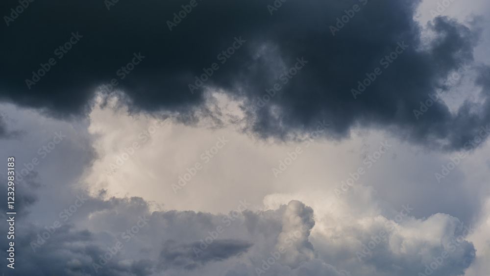Storm clouds cover the sky in the evening.