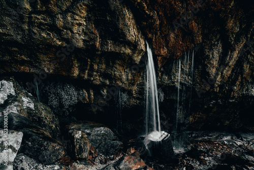 water falling from a cliff