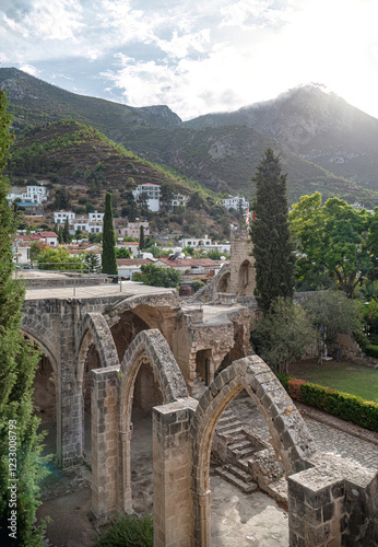 Bellapais Abbey ruins overlooking Bellapais village and Kyrenia mountains in Cyprus