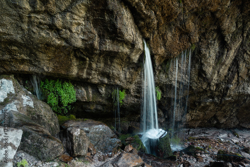 water falling from a cliff