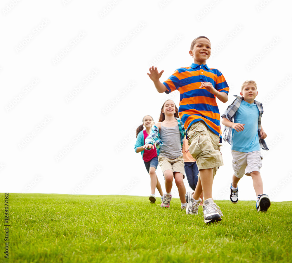 Playing, running and group of kids on grass for outdoor games, race and happy development space. Adventure, energy and children in field together with smile, growth and fun summer mockup on low angle Playing, running and group of kids on grass for outdoor games, race and happy development space. Adventure, energy and children in field together with smile, growth and fun summer mockup on low angle
