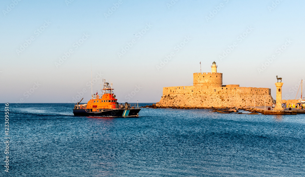 Fototapeta premium Coast Guard ship in Mandraki port in Rhodes town, Greece