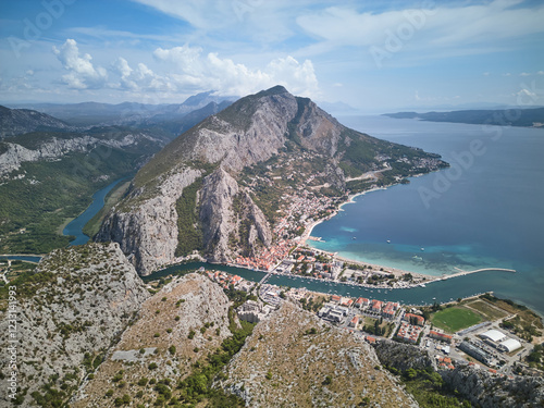 Panoramic view of the Omis town, Cetina canyon and river and surrounding mountains, Croatia