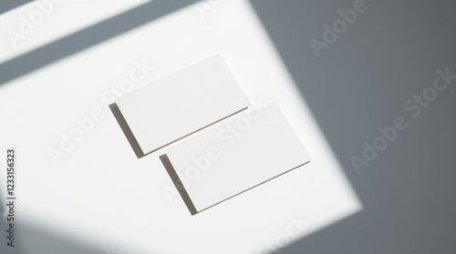 Minimalist business cards on geometric background