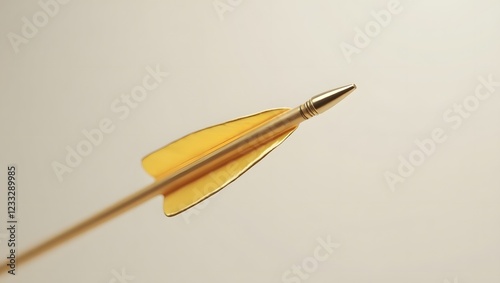 A striking golden arrow, gleaming as it moves effortlessly through a clean space.


