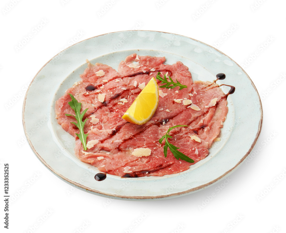 Delicious beef carpaccio with arugula, cheese, balsamic vinegar and lemon isolated on white Delicious beef carpaccio with arugula, cheese, balsamic vinegar and lemon isolated on white