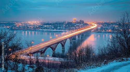Wallpaper Mural Captivating Night View of City Bridge over River in Winter. Scenic urban landscape photography, showcasing a bridge illuminated at night with snow-covered banks. Torontodigital.ca
