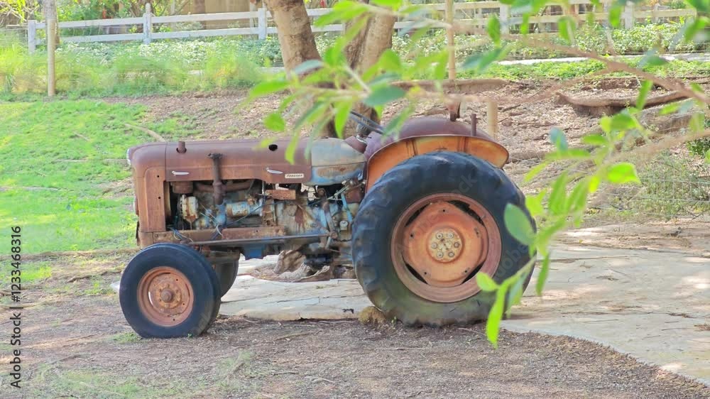 An old tractor has been left unused. An old tractor has been left unused.
