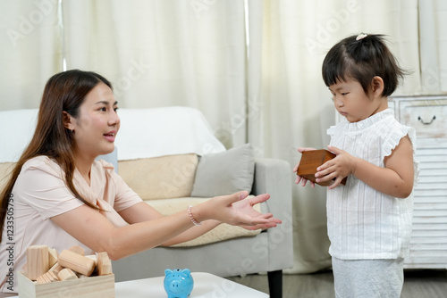 Asian teacher teaches children before enter kindergarten. Child handing a wooden toy to teacher, learning cooperation and sharing. Interactive playtime promotes communication and social development. photo