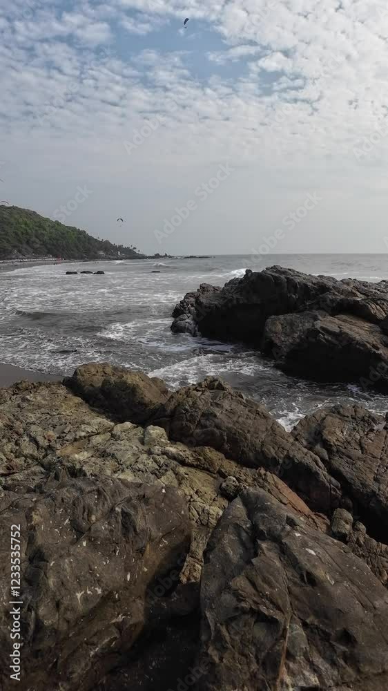 Ocean Waves Crashing On The Big Black Rocks On The Seashore Ocean Waves Crashing On The Big Black Rocks On The Seashore