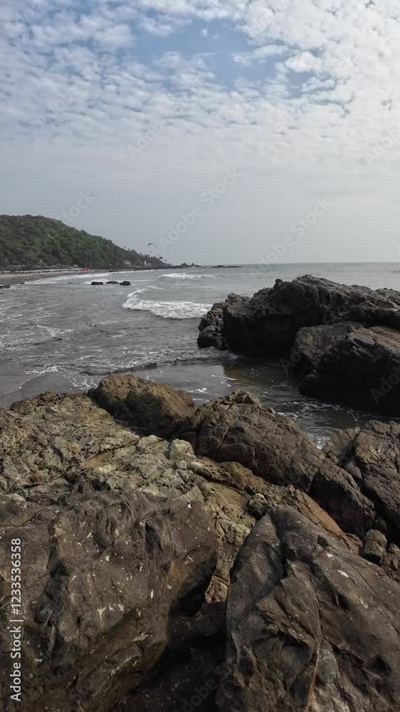 Ocean Waves Crashing On The Big Black Rocks On The Seashore Ocean Waves Crashing On The Big Black Rocks On The Seashore