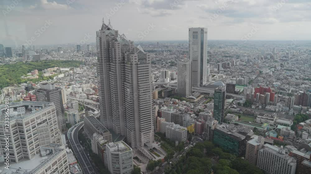 Timelapse video captures the breathtaking view of Tokyo's vibrant cityscape from the Tokyo Metropolitan Government Building's observation platform, showcasing the dynamic metropolis. Timelapse video captures the breathtaking view of Tokyo's vibrant cityscape from the Tokyo Metropolitan Government Building's observation platform, showcasing the dynamic metropolis.