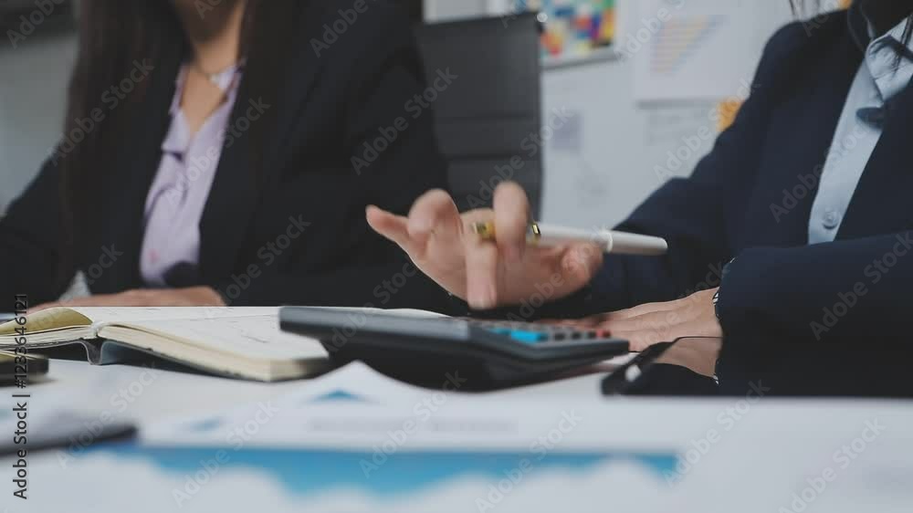 Hands of creative millennial business people working in meeting Hands of creative millennial business people working in meeting