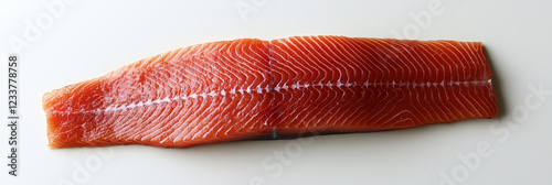 Fresh red snapper fillet with vibrant red color on white background