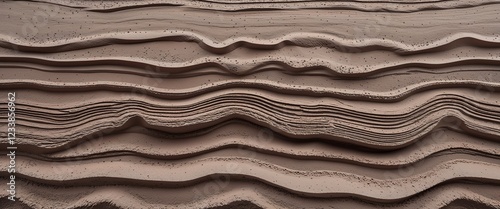Muted taupe alluvial sand with layered sediment streaks