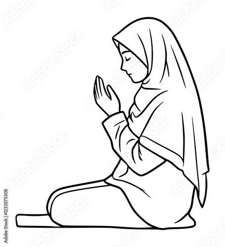 A Muslim girl is praying. photo