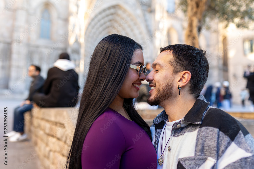 Smiling Latino couple face to face enjoying vacation in Barcelona, Spain Smiling Latino couple face to face enjoying vacation in Barcelona, Spain
