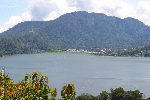 Buyan lake and mountains in Bedugul, Bali, Indonesia.
A village by the lake of Buyan in Bedugul, Bali. photo