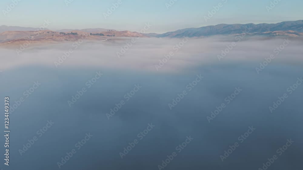 Aerial view of Castaic Lake above the clouds with a drone Aerial view of Castaic Lake above the clouds with a drone