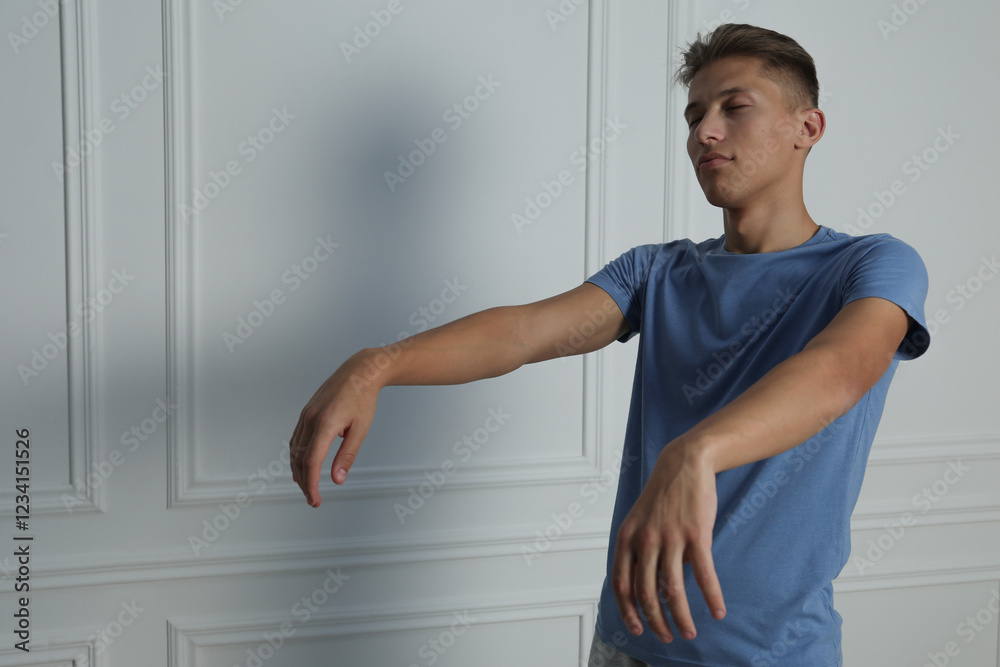 Naklejka premium Young man suffering from sleepwalking at home, space for text