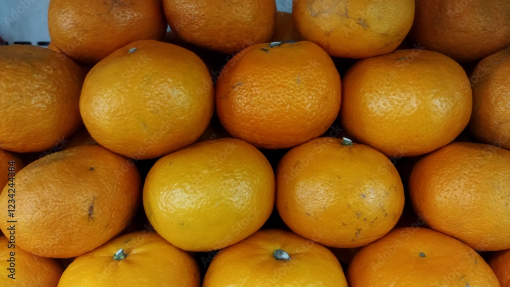 Stacked oranges at the market Stacked oranges at the market