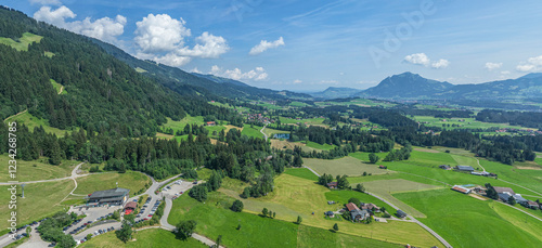 Blick auf die Region der Hörnerdörfer bei Bolsterlang im sommerlichen Oberallgäu photo