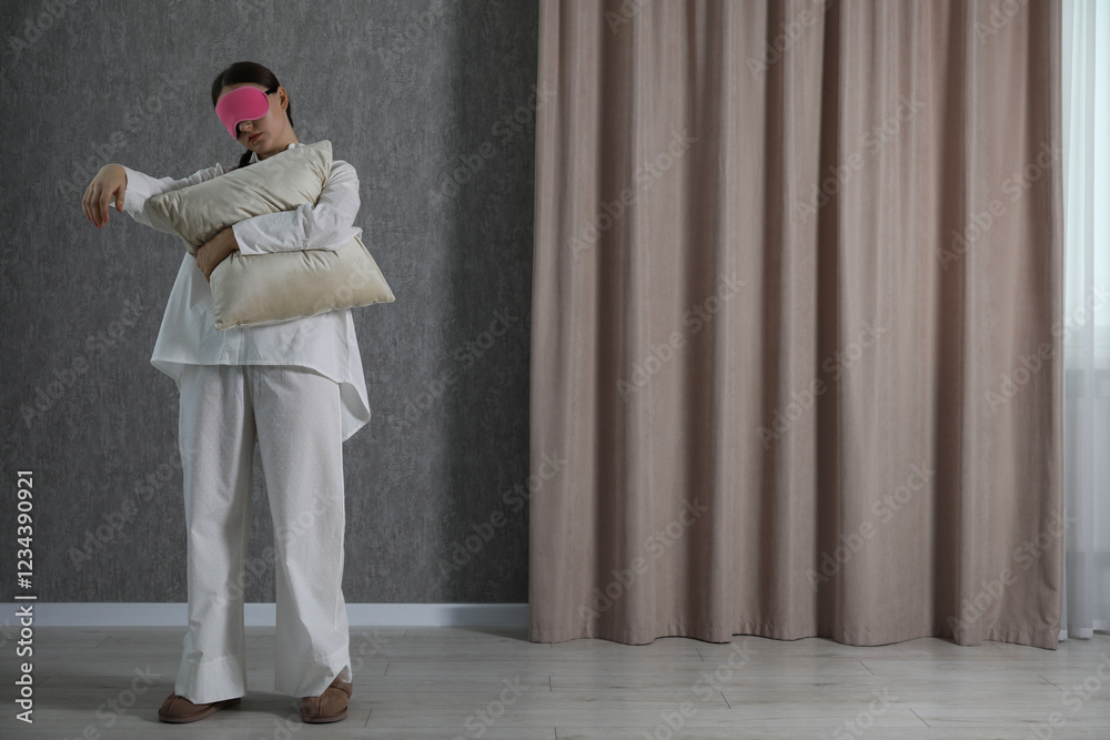 Young woman suffering from sleepwalking at home, space for text Young woman suffering from sleepwalking at home, space for text