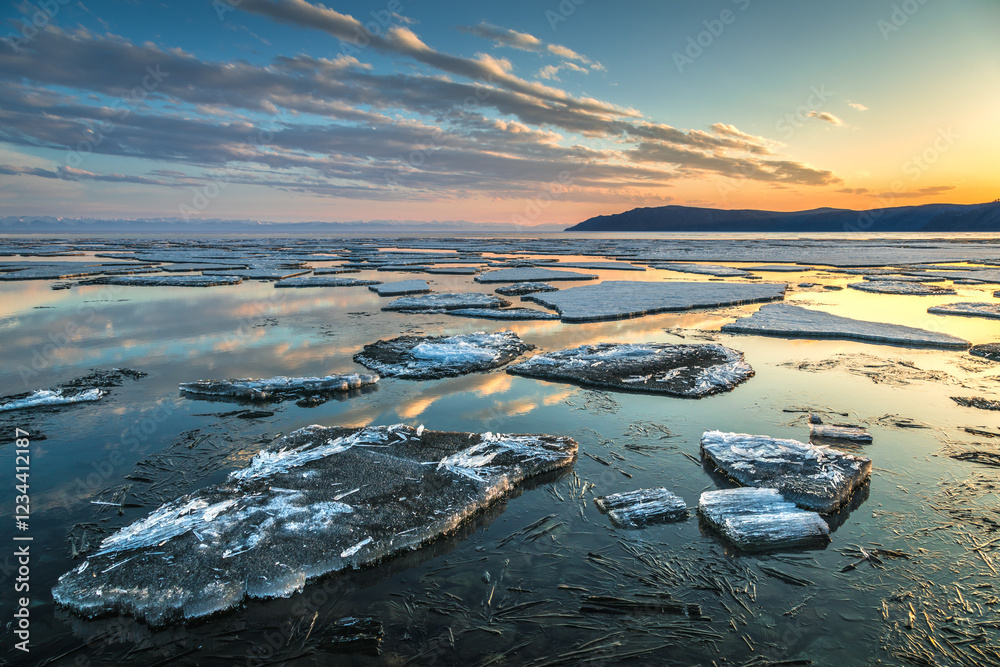 Fototapeta premium ice drift on Lake Baikal at the source of the Angara River in spring