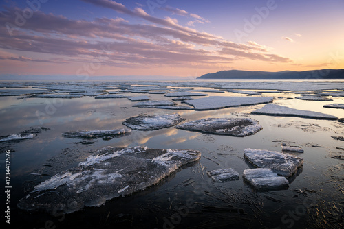 ice drift on Lake Baikal at the source of the Angara River in spring