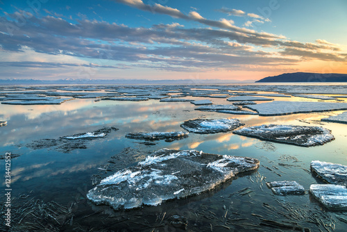 ice drift on Lake Baikal at the source of the Angara River in spring