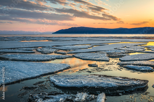 ice drift on Lake Baikal at the source of the Angara River in spring