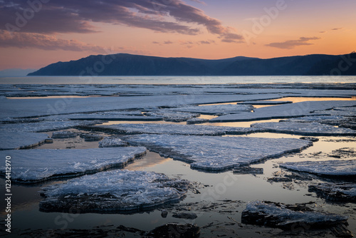 ice drift on Lake Baikal at the source of the Angara River in spring