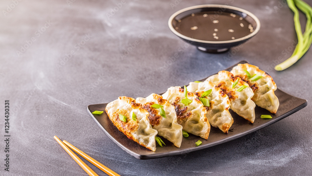 gyoza or dumplings snack with soy sauce